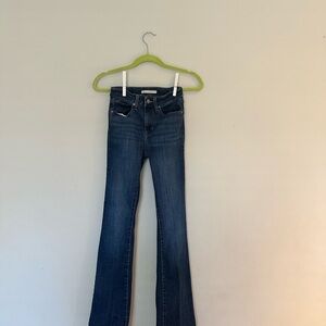 Women’s Levi’s 725 high rise bootcut cut jeans size 25, medium wash denim